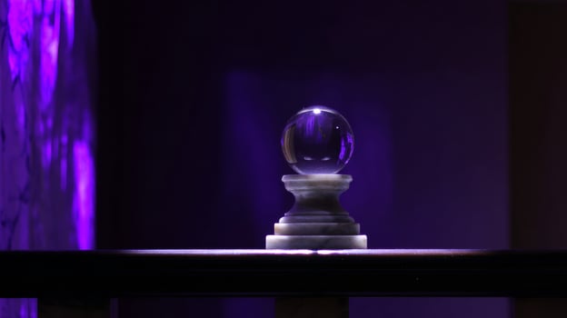 image of a crystal ball with purple light photo
