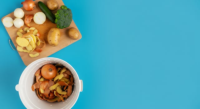 A bowl of vegetables and a pot of vegetables photo