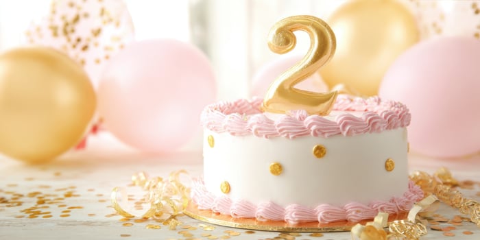 The delightful two-tier cake celebrating a special birthday milestone. photo