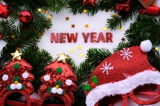 Abstract background of Christmas attributes The inscription NEW YEAR. photo