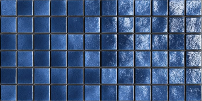 The vibrant blue tile mosaic creating a modern and stylish interior design. photo
