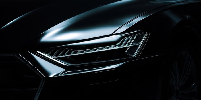 The sleek black car silhouette showcasing innovative automotive design and elegance. photo