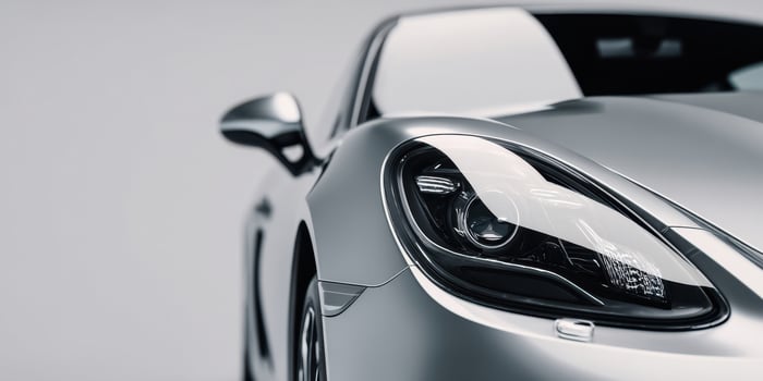 The luxurious silver car showcasing elegant design and modern automotive technology. photo