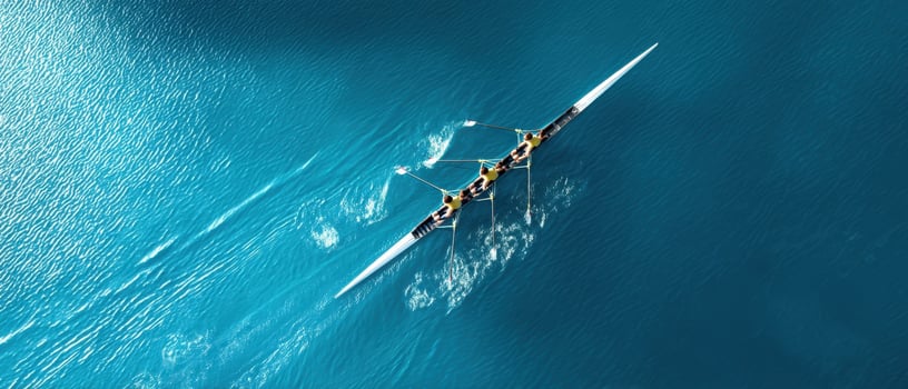 The rowing team gliding through serene turquoise waters in perfect synchronization. photo
