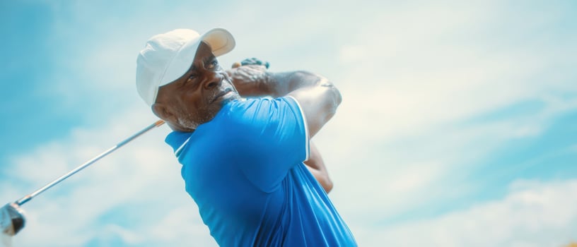 The Golfer Perfecting His Swing Under a Bright Blue Sky photo