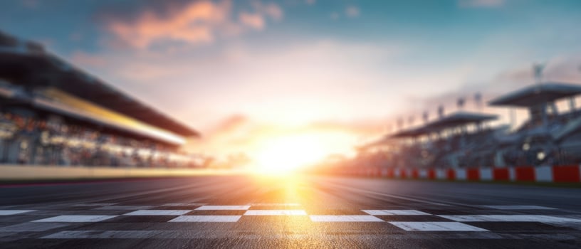 The finish line at a race track during a breathtaking sunset moment. photo