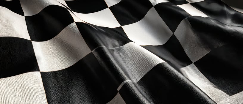 The elegant black and white checkered fabric creates a stunning visual texture. photo