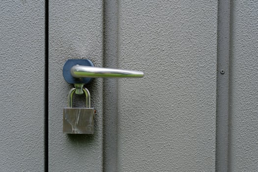 A Door Handle with Padlock photo