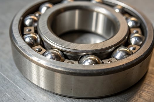 Ball Bearing Close-up on Metal Surface photo