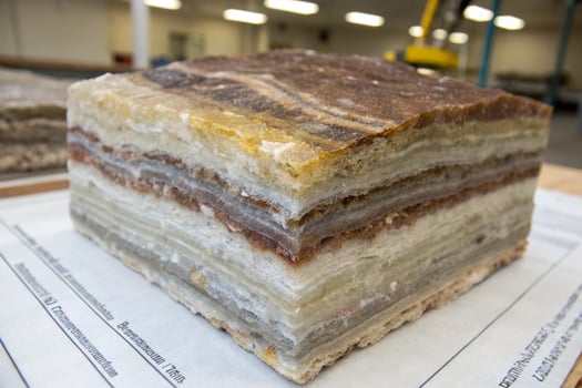 Mineral Block of banded calcite, multi-layered crystal stone photo