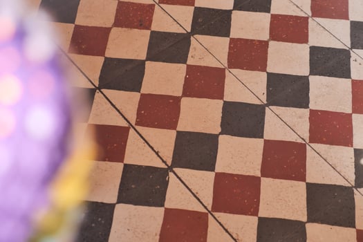 Colorful checkerboard floor design in a vibrant space photo