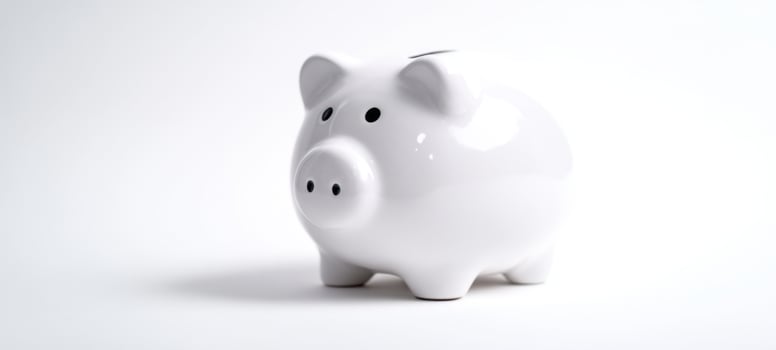 The white piggy bank symbolizing savings and financial planning. photo