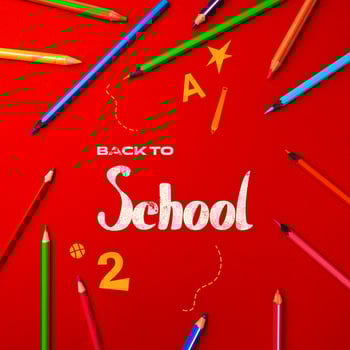 Colorful school supplies arranged creatively on a vibrant red background inviting back-to-school excitement photo
