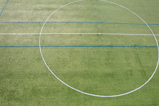 A Top Down Drone Shot of an Artificial Turf Pitch. Concept The perfection of modern sports surfaces. photo