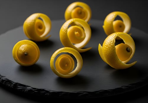 Lemon Peel Spirals on Dark Slate Plate photo