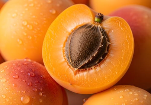 Fresh Apricots with Exposed Pit and Soft Texture photo