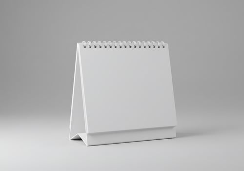 Blank White Desk Calendar on Gray Background for Mockup Template photo