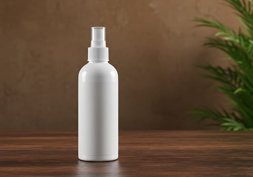 White Spray Bottle Mockup on Wooden Surface with Indoor Greenery photo