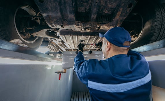 Changing oil in a car photo
