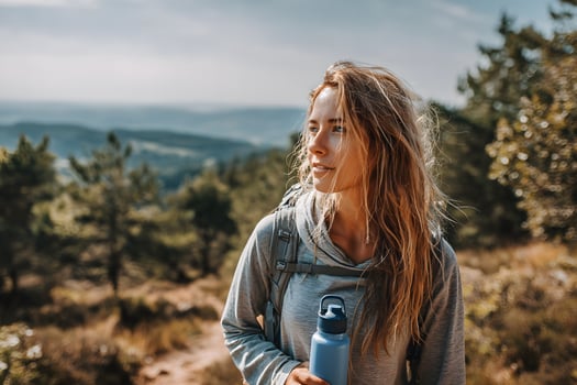 woman hiking in the mountains photo