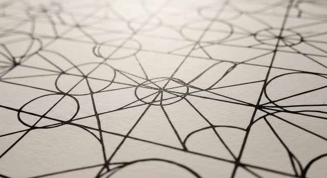 A drawing of a geometric pattern on a white surface photo