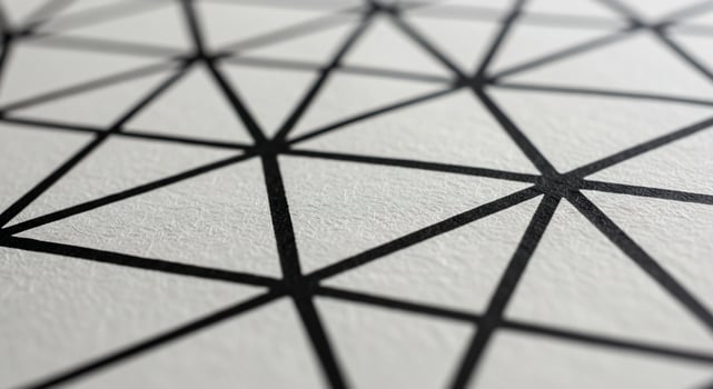 A close up of a black and white geometric pattern photo