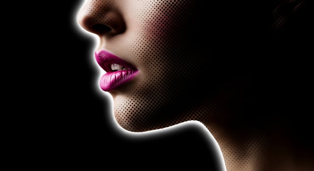 A woman's face with a pink lip and halos photo