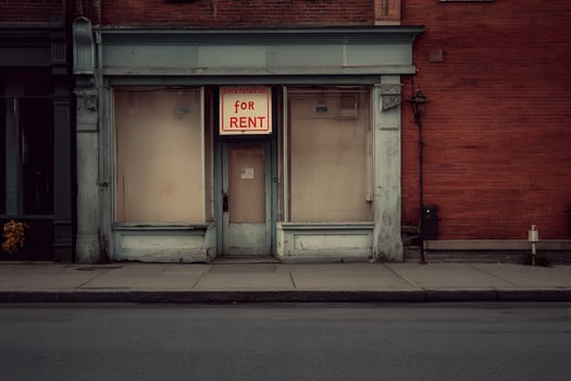 Closed Storefront with For Rent Sign on Empty Urban Street photo