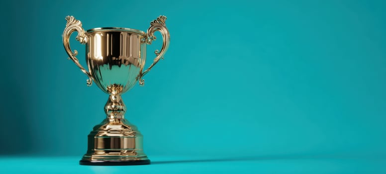 The golden trophy symbolizing success and recognition against a vibrant background. photo