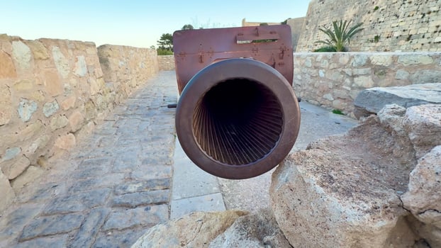 The Historic Cannon View in a Stone Fortress showcases ancient military design and history photo
