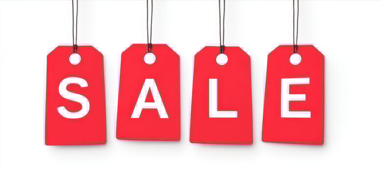 The vibrant sale tags hanging to attract customers for special promotions photo