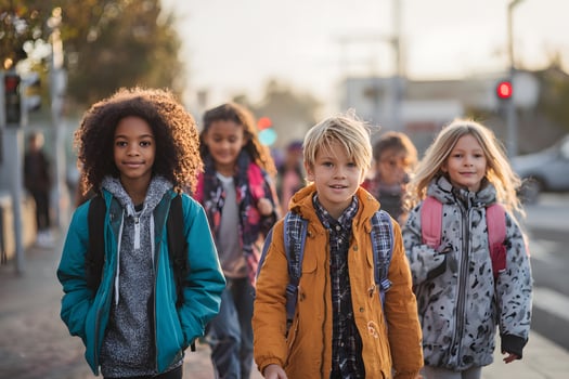 Diverse Children Walking Together to School with Backpacks photo