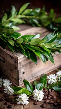 Green Leaves and White Flowers Adorn Coffee Beans on a Wooden Surface. photo