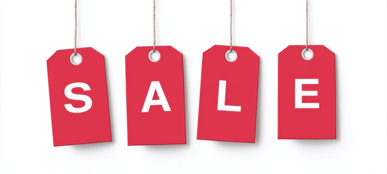 The sale tags displaying bold letters for promotional marketing events. photo