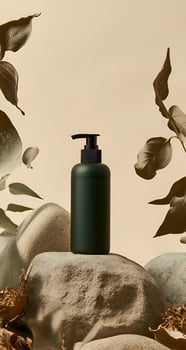Dark green pump bottle on rocks with leaves matt photo