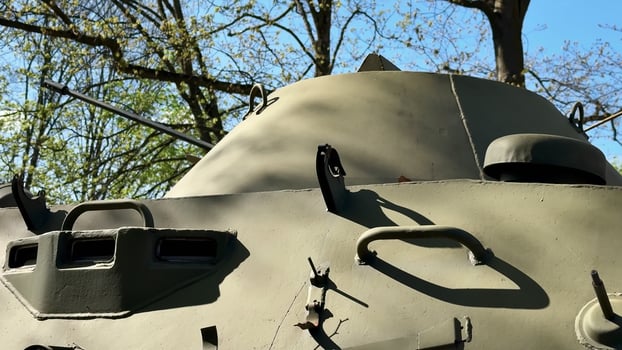 A Tank Hull Depicted in Its Natural Surroundings, Blending History with Natures Beauty photo