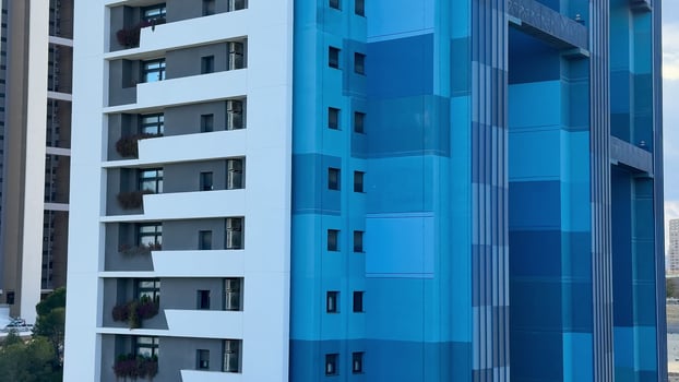 A Modern Blue Residential Building Featuring Distinctive and Innovative Architecture photo