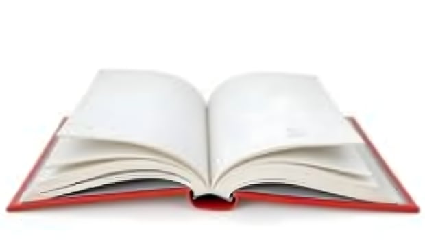 Hardcover Red Book with Blank Open Pages on White Background photo