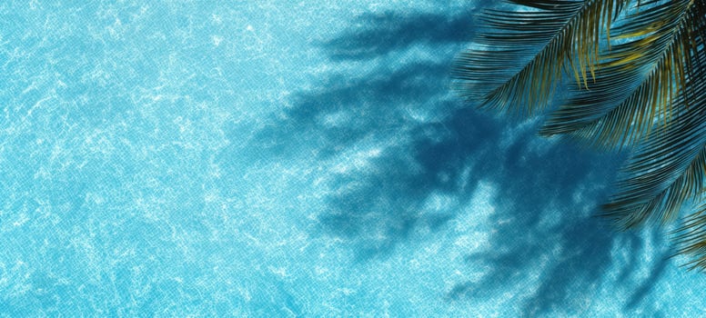 The tranquil blue waters shimmering under gentle palm shadows for a perfect escape. photo