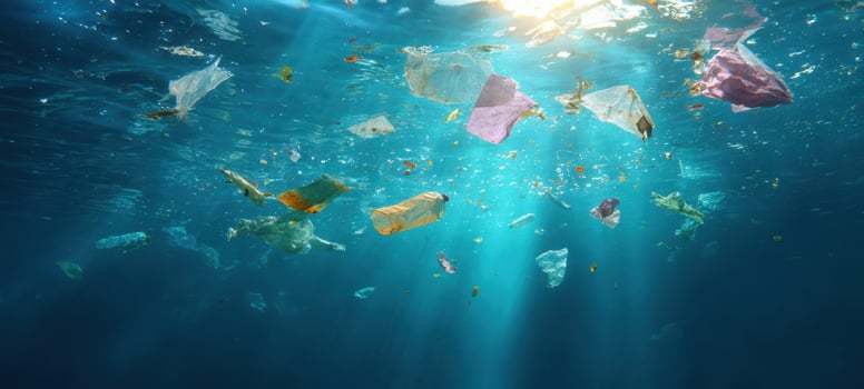 The underwater scene filled with plastic waste highlighting marine pollution issues. photo