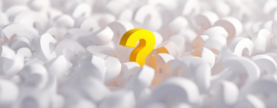 The Yellow Question Mark Among a Sea of White Curiosities photo
