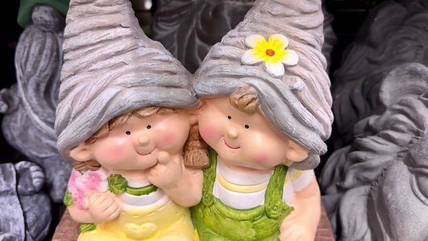 Discover charming garden gnome figurines that elevate your home decor to a new level of cheerfulness photo