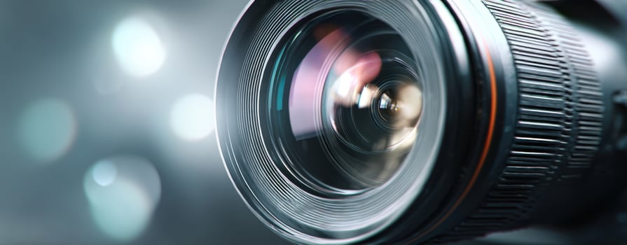 The Close-Up of a Professional Camera Lens with Stunning Light Effects photo