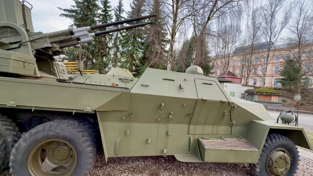 A Military Vehicle Presented in a Context That Highlights its Historical Importance and Background photo