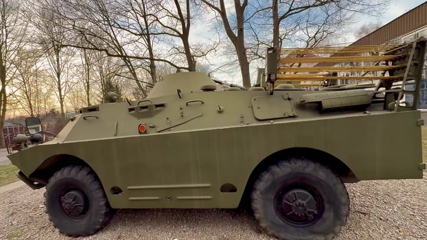A Vintage Military Armored Vehicle is currently on Display for all to see and appreciate photo