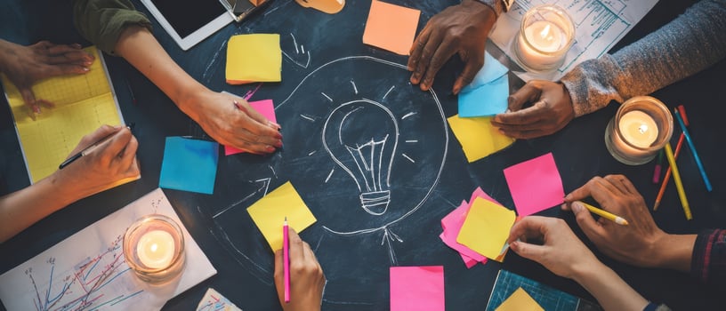 The collaborative brainstorming session around a creative workspace with bright ideas. photo