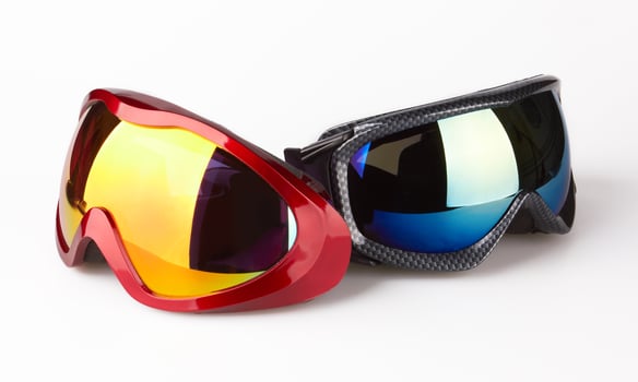 Ski goggles on white back photo