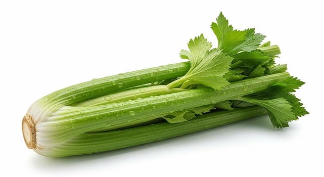 Fresh Green Celery Bunch with Water Droplets on White Background. photo
