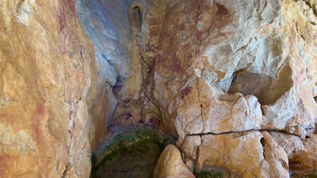 A Stunning Cave Interior Filled with Vibrant and Colorful Rock Formations That captivate photo