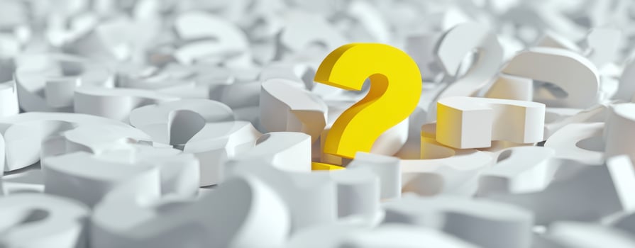 The vibrant yellow question mark among a sea of white confusion. photo